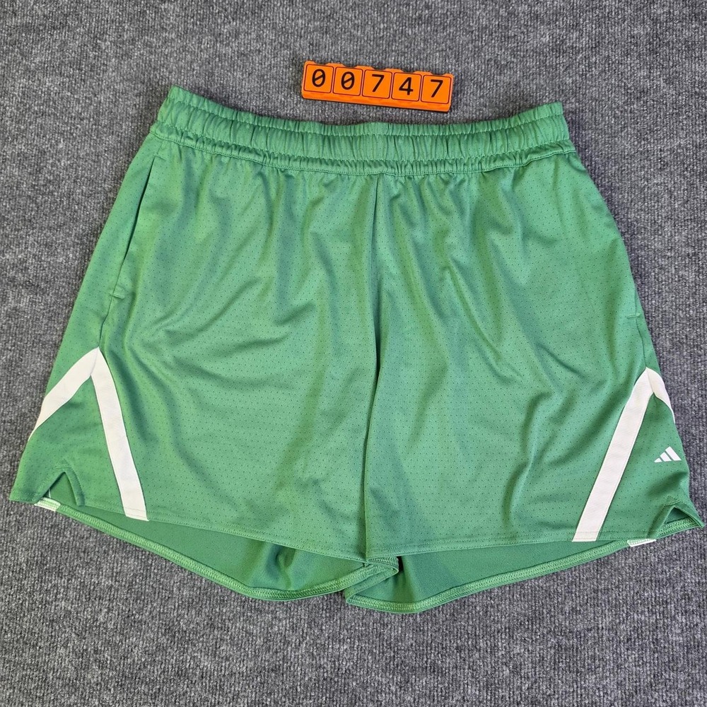 Adidas green shorts with white stripes on sides Size XL